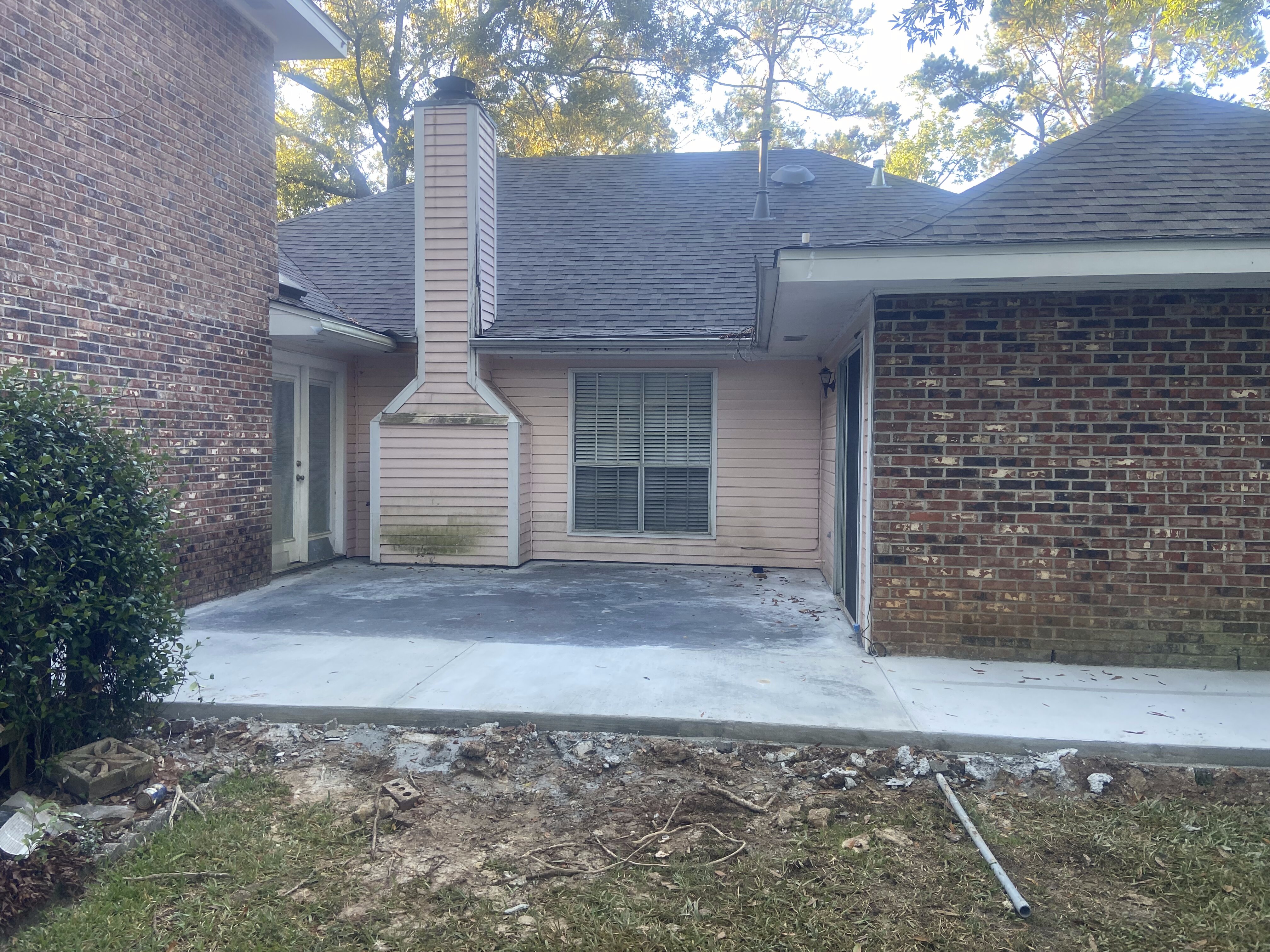New concrete foundation and slab poured for sunroom addition