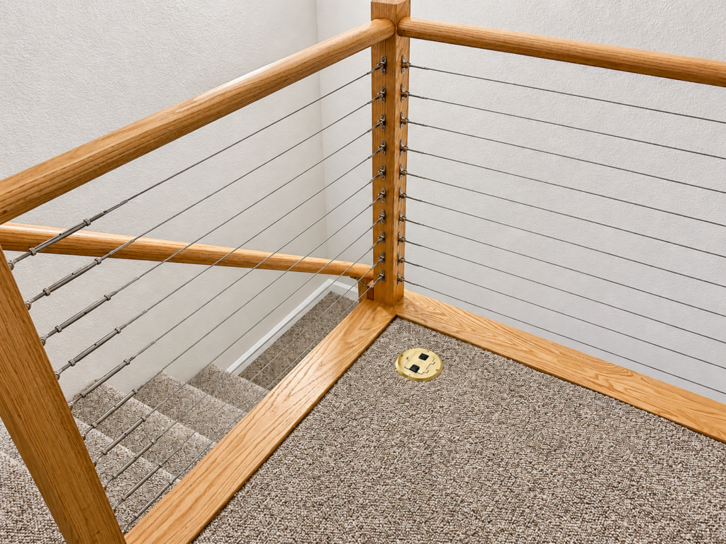 Close-up of wood and cable stair railing detail