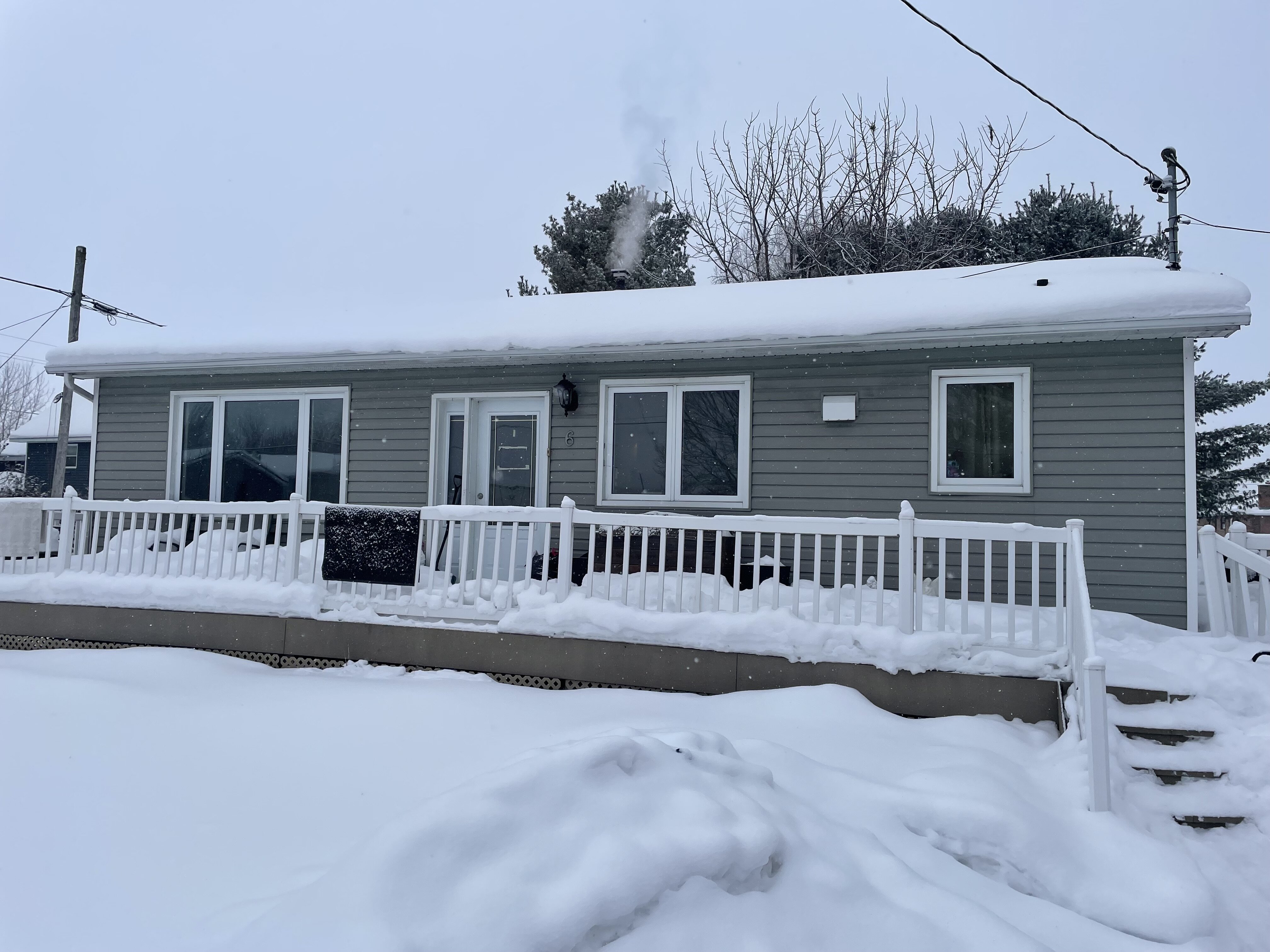 House purchased for cash by Family Home Buyers in Okotoks, Alberta