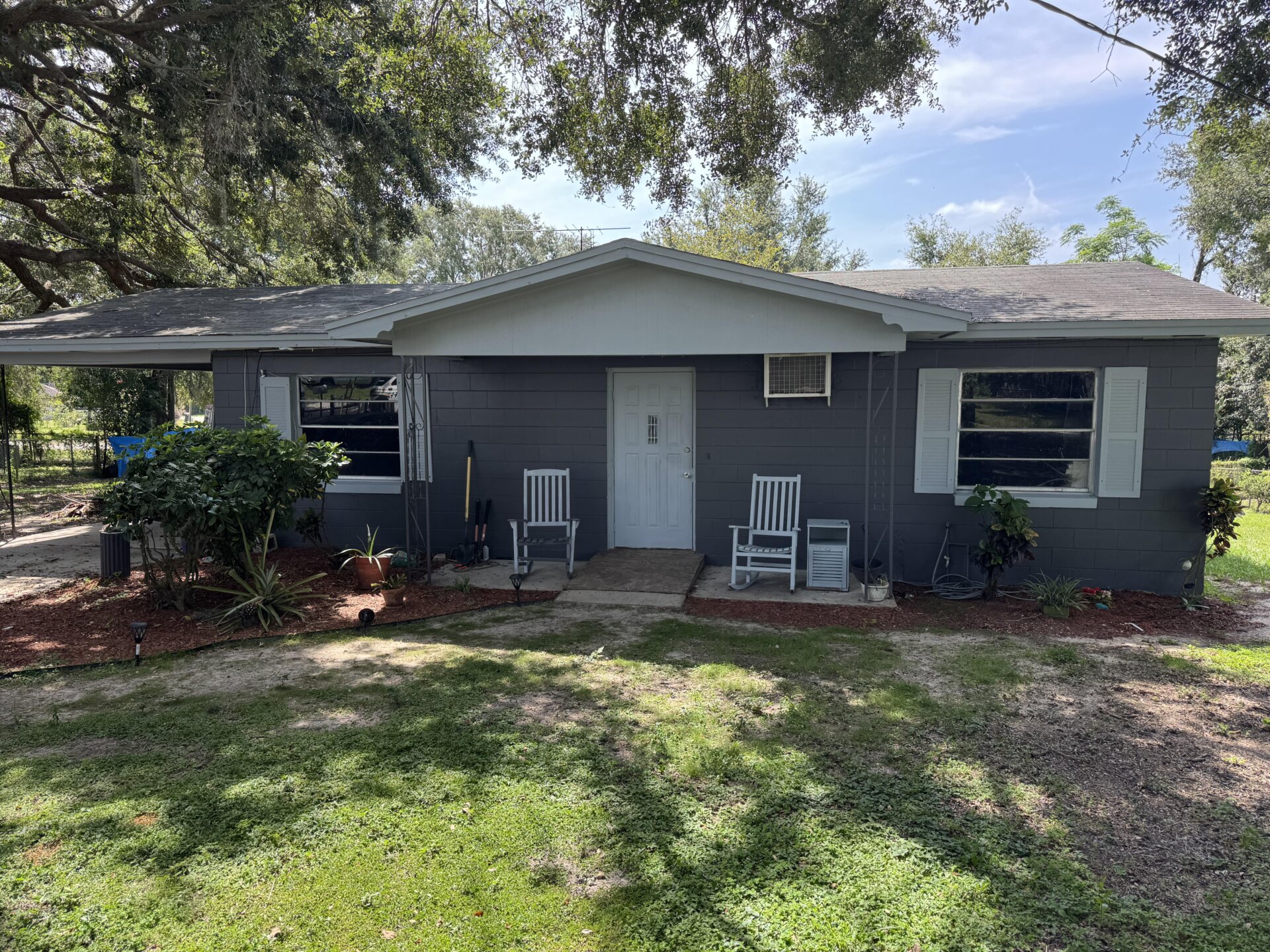 Rural gray block house in Bartow, Fl.