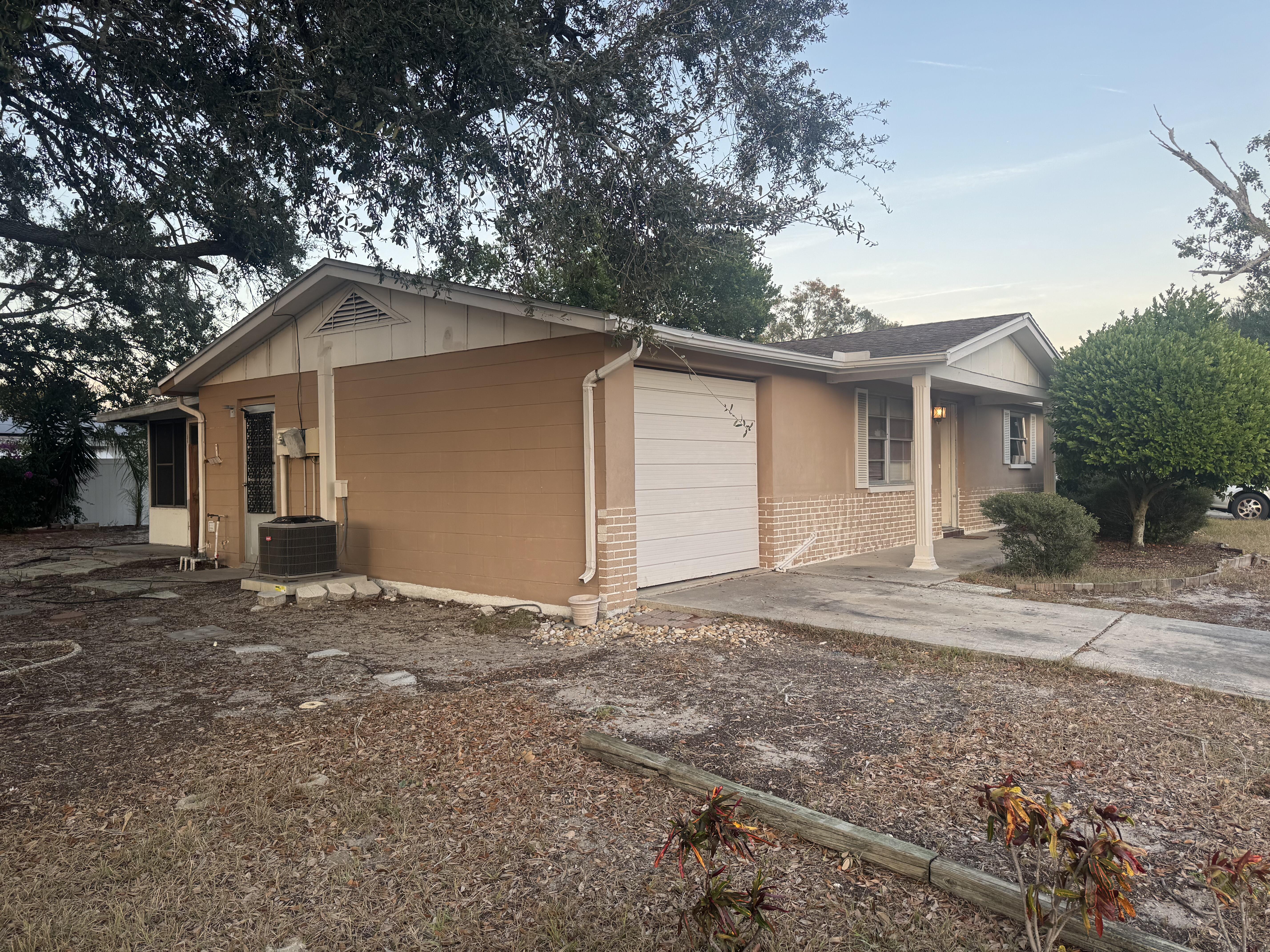 Light Brown colored block home in Port Richey Fl.