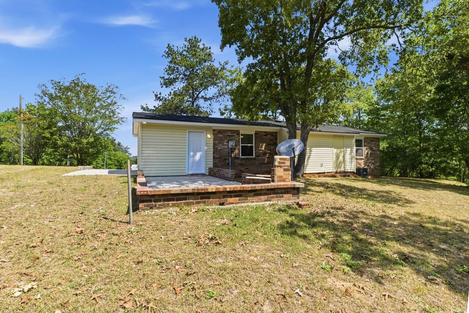 Cream and brick ranch exterior in the CSRA