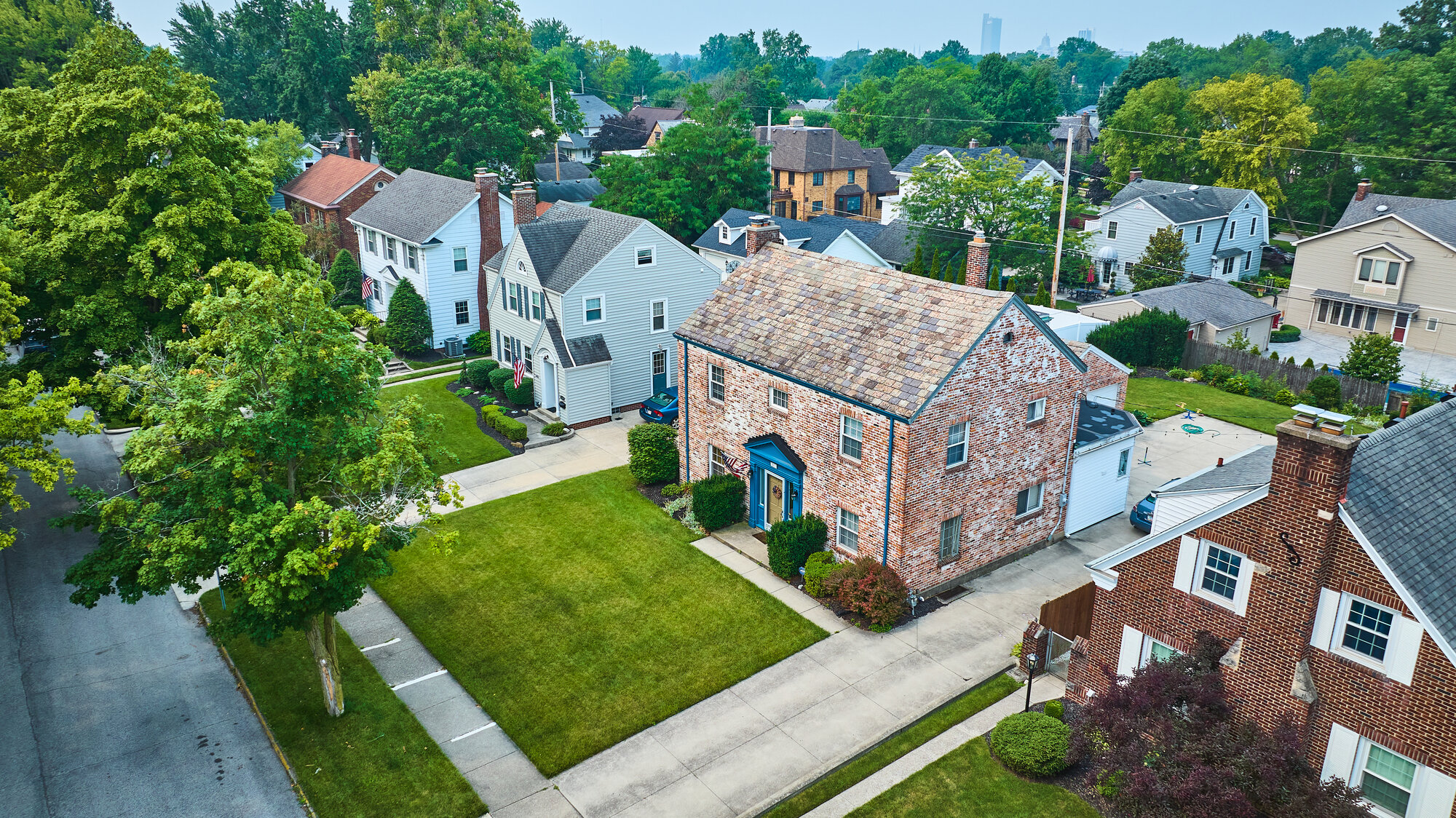 Image of Aerial of houses off Pemberton Dr with distant Fort Wayne downtown skyscrapers
