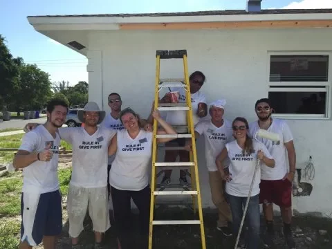 texas home buyers team wearing give first shirts