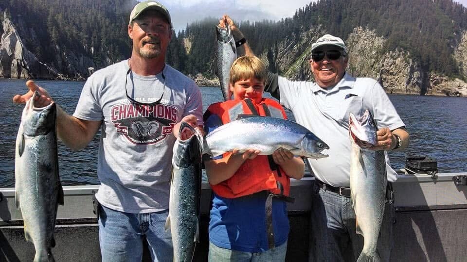 Todd Murphy and family holding big fish