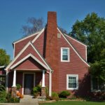 Red brick Michigan home chimney — sell rental property landlord cash buyer Metro Detroit