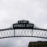 Flint Michigan vehicle city sign — sell house fast Flint cash buyer Genesee County
