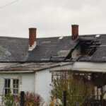 Damaged Michigan house roof — sell house as-is cash buyer Metro Detroit repair