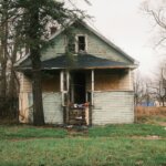 Vacant Michigan home Flint MI — sell vacant house cash buyer neglected yard Genesee County