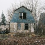 Old blue vacant Michigan home Flint MI — sell house fast Michigan cash buyer abandoned