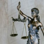 Real estate attorney reviewing a Michigan home sale contract