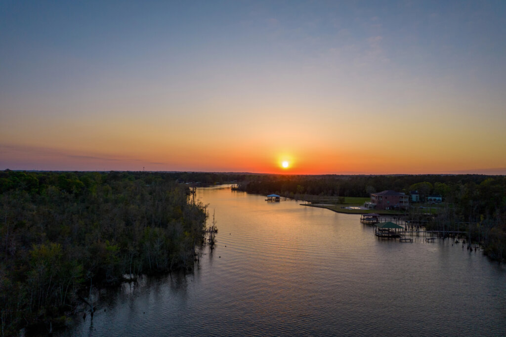 Aerial view of Halls Mill Creek in Theodore, Alabama at sunset