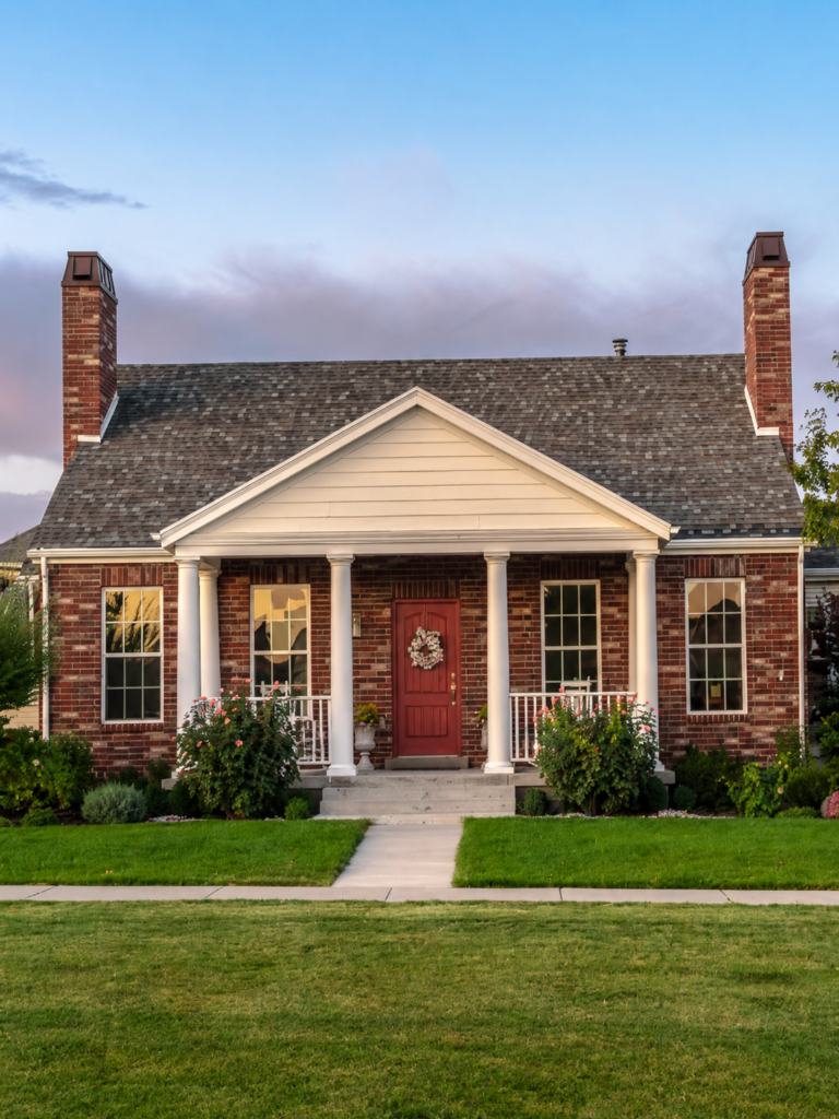 Tidy suburban home at dusk