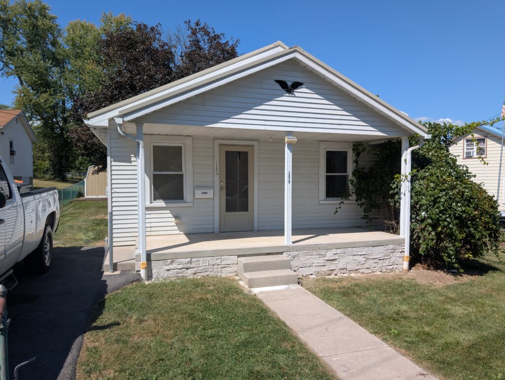 buyer and seller shake hands over a cash home sale