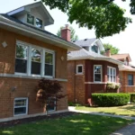 Local buyer reviewing property condition in North Lawndale