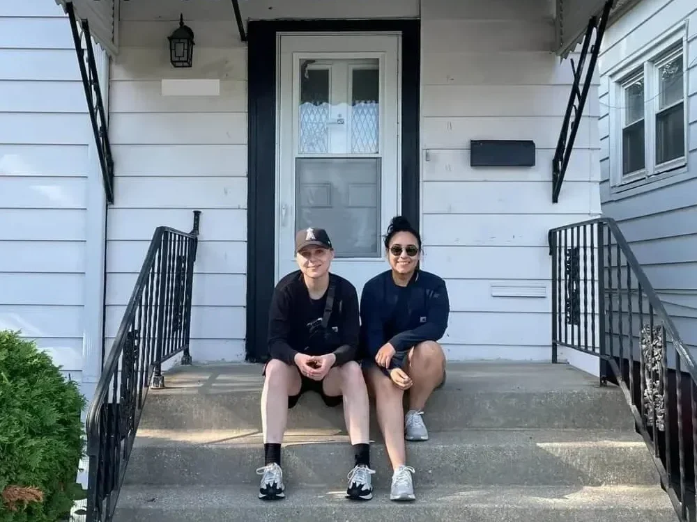 Alexa Cardello and Karen Rodriguez from Dello Investments reviewing a Chicago house for a cash offer.