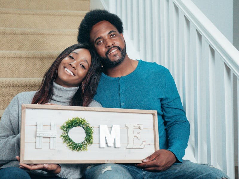 Happy homeowners after selling their house for cash