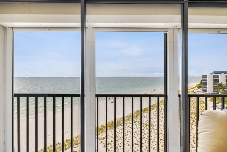 Gulf of Mexico and beach view through the indoor patio sliding doors