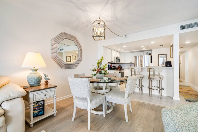 Dining table beside the kitchen breakfast bar