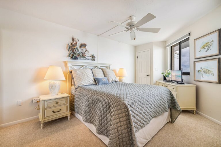 Guest bedroom queen bed with nightstands and lamps