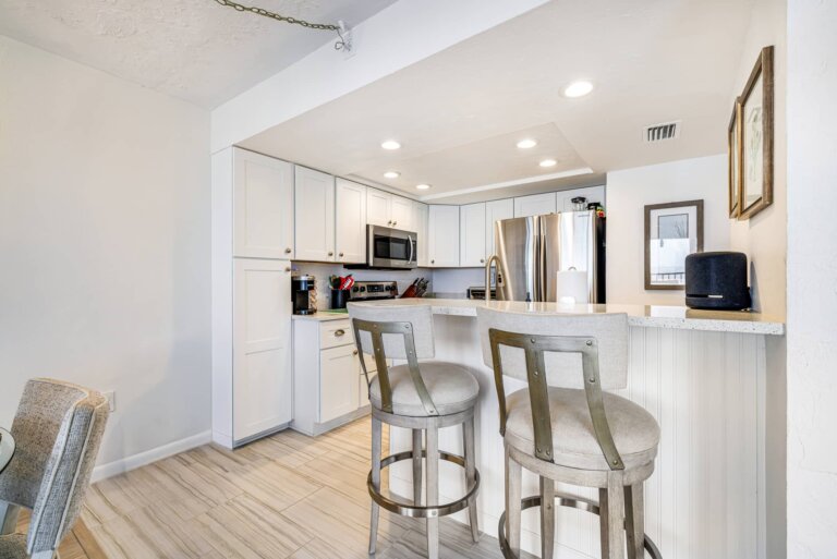 Kitchen breakfast bar with two bar stools