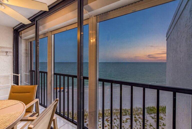 Sunset over the Gulf from the indoor patio at Seascape Endless Blue