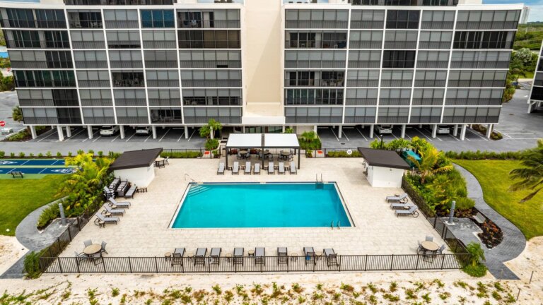 Aerial view of the community pool deck and lounge chairs