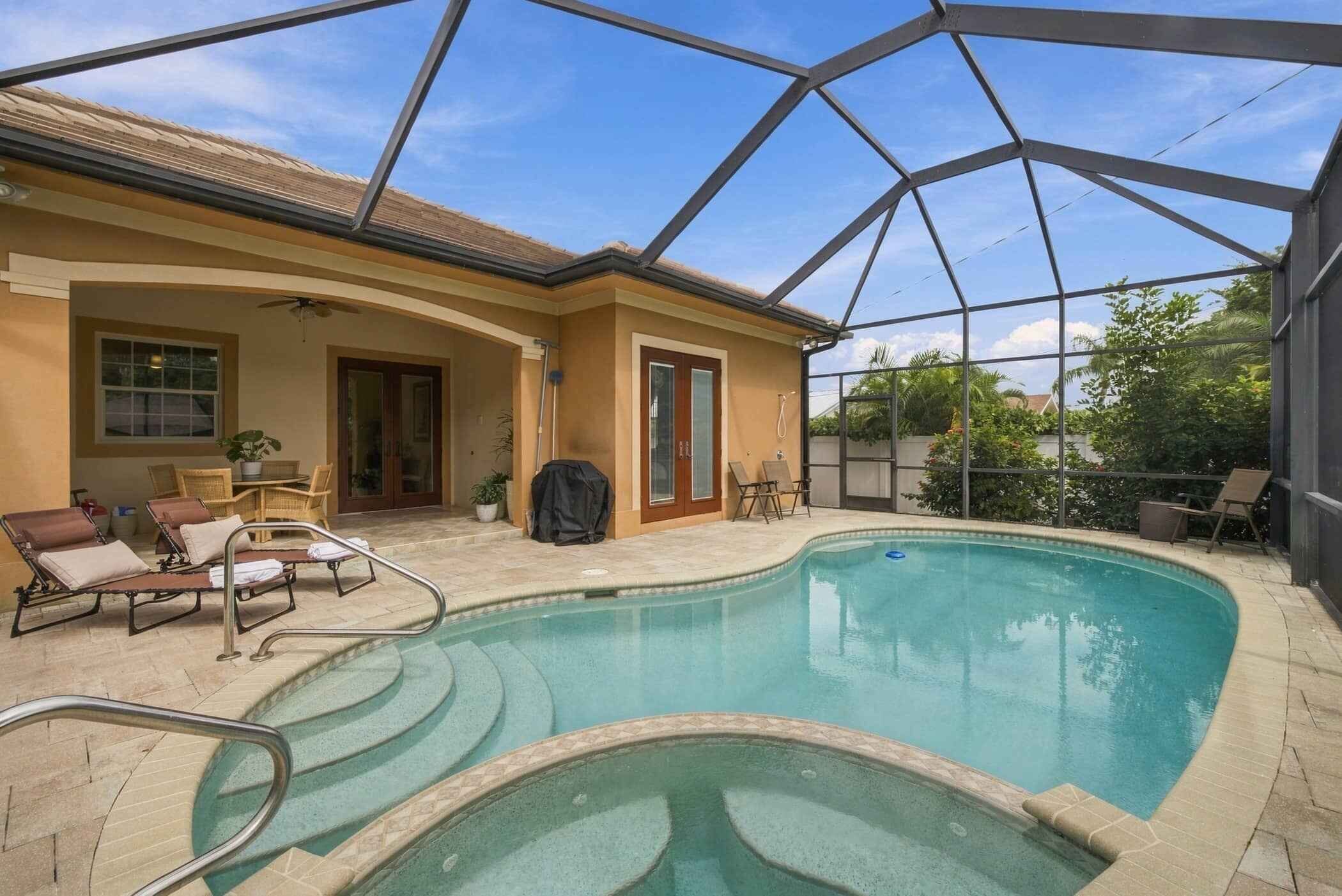 Private screened pool with an adjoining basin next to the covered lanai