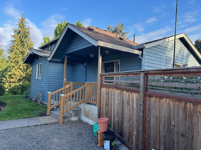 Covered side entrance before the exterior painting project