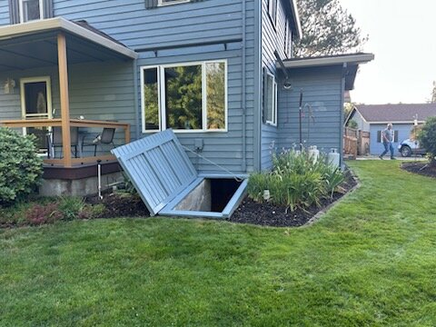 Rear exterior and covered porch before painting work