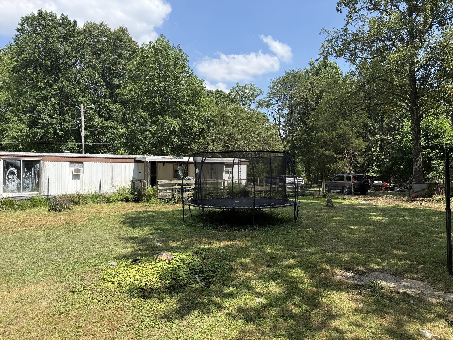 Manufactured home on a large lot in Borden, Indiana under contract with a local investor