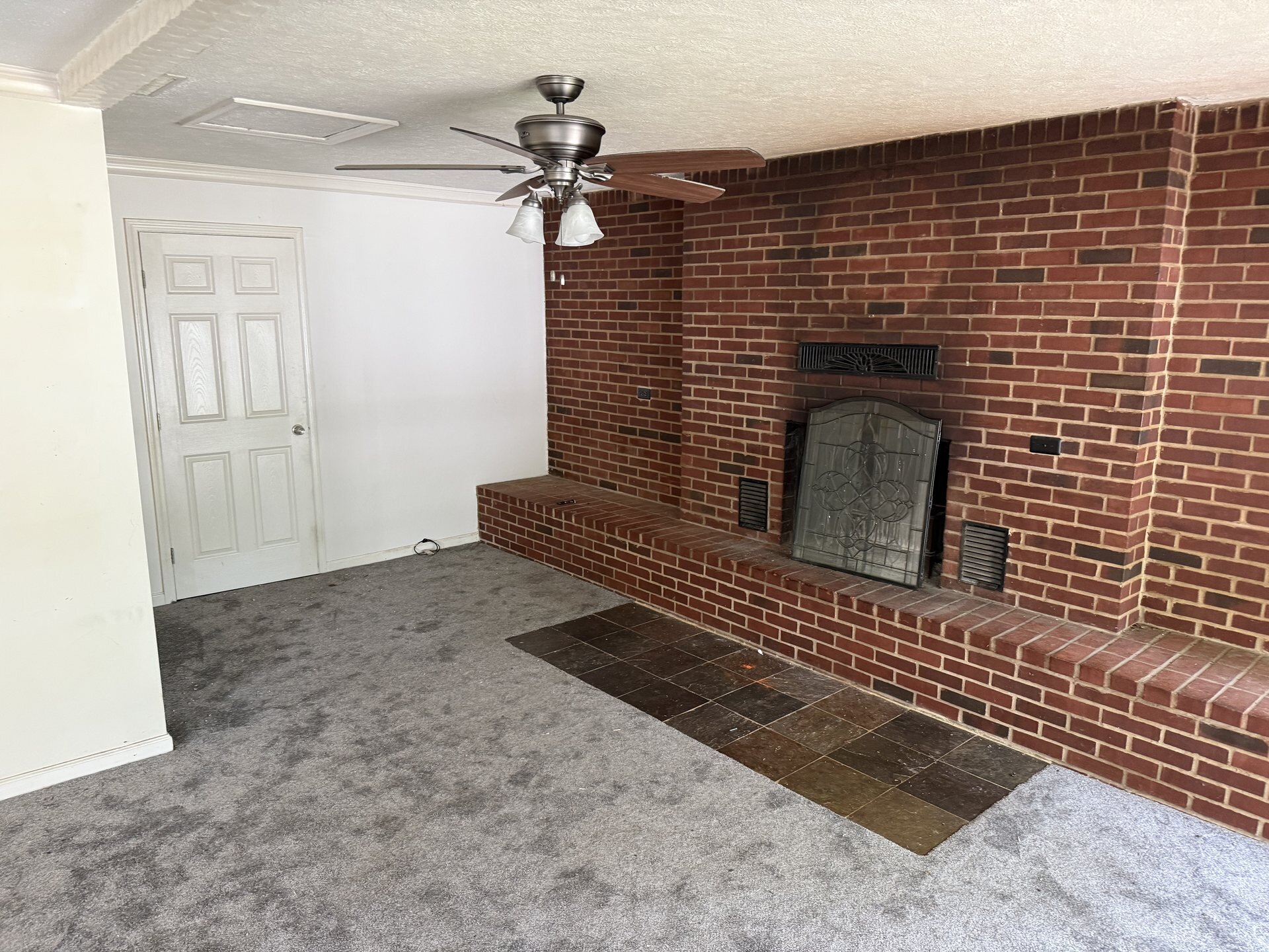 Dated interior of a Clarksville, Indiana home bought as-is, no cleaning or repairs needed