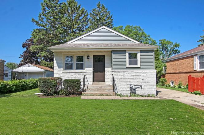 Exterior of the Waukegan home at Butrick St after renovation by Greentown Home Buyers
