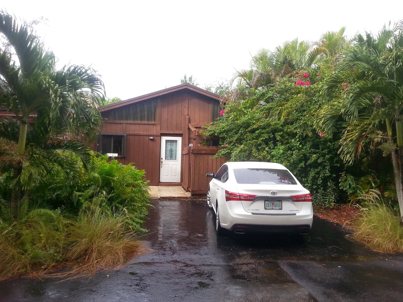 Single-family home with a driveway in South Florida