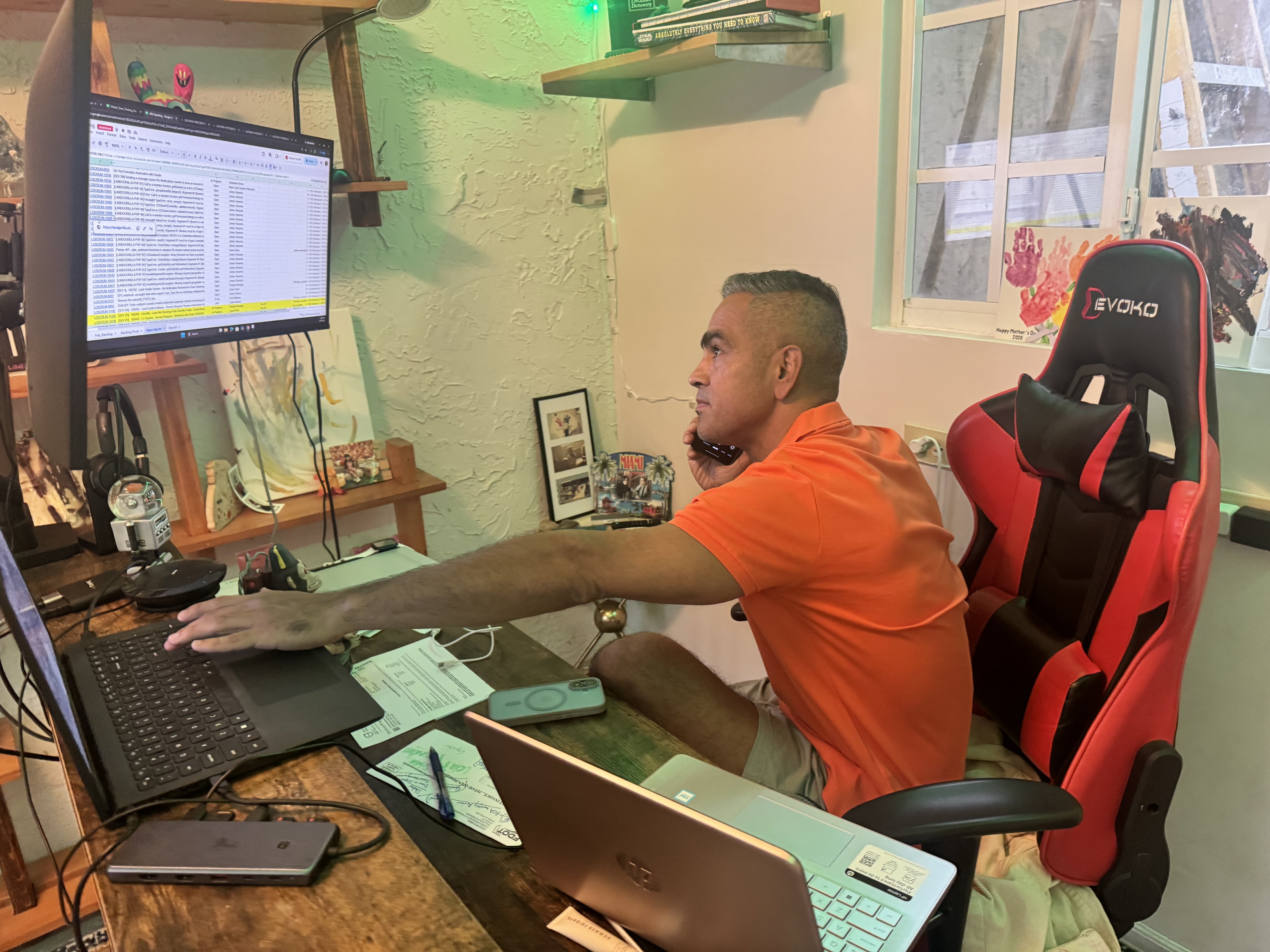 Henry Gonzalez taking a seller call from his Miami office