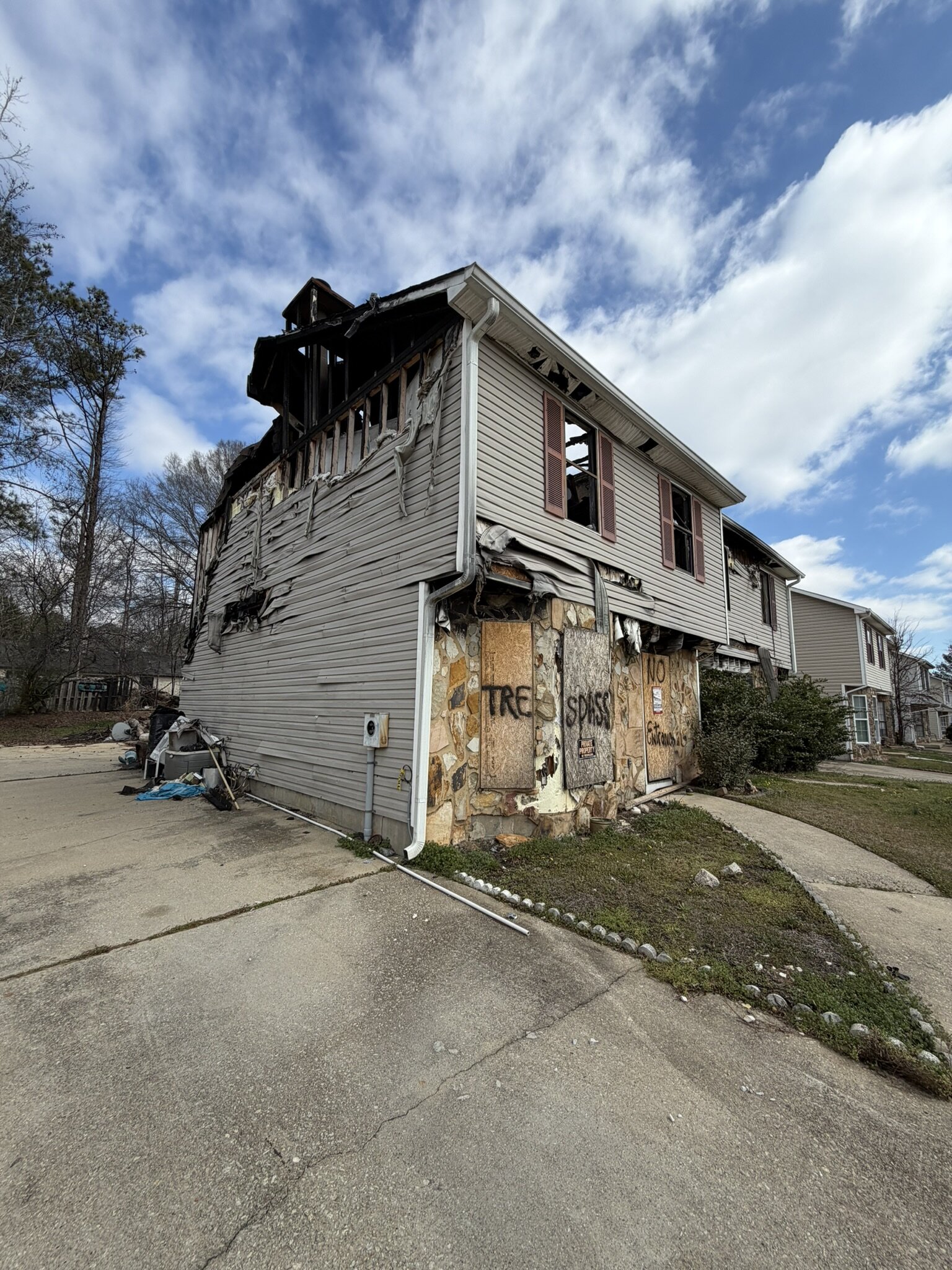 Fire-damaged home bought and renovated by TLX Homes