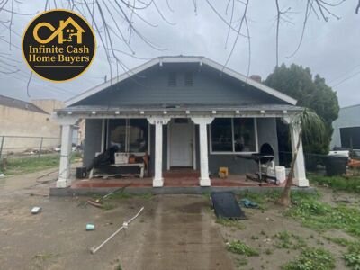 Fresno house needing major repairs before cash purchase and renovation by Infinite Cash Home Buyers