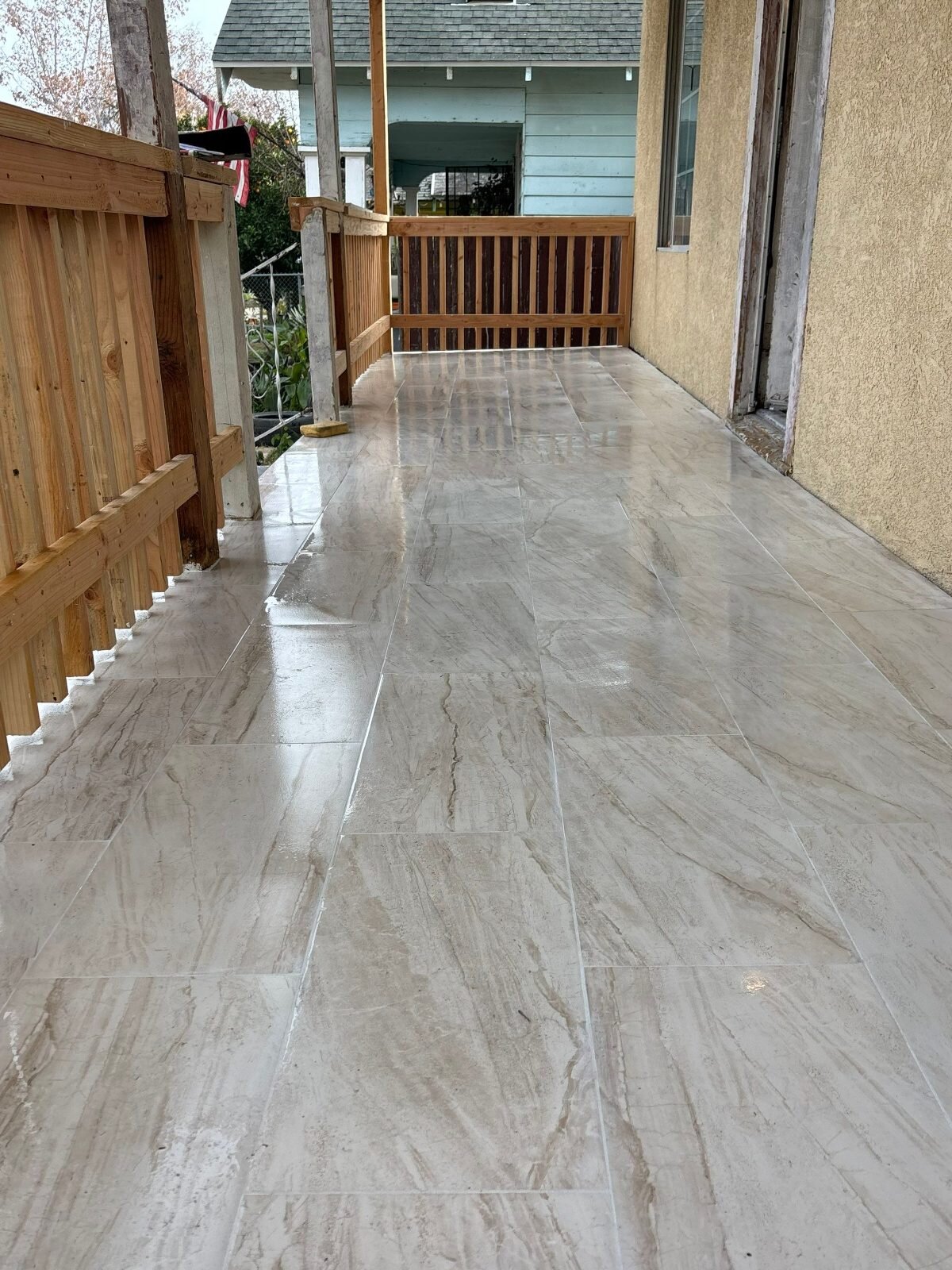 The same Fresno porch after our crew laid new tile
