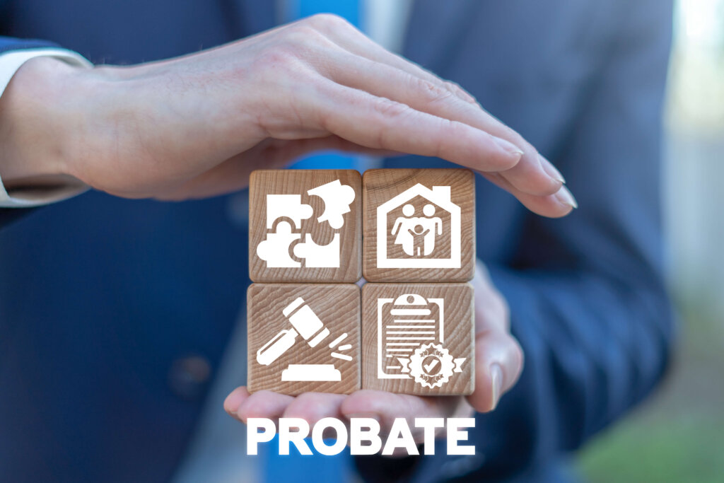 Hands cupped around wooden blocks with probate icons
