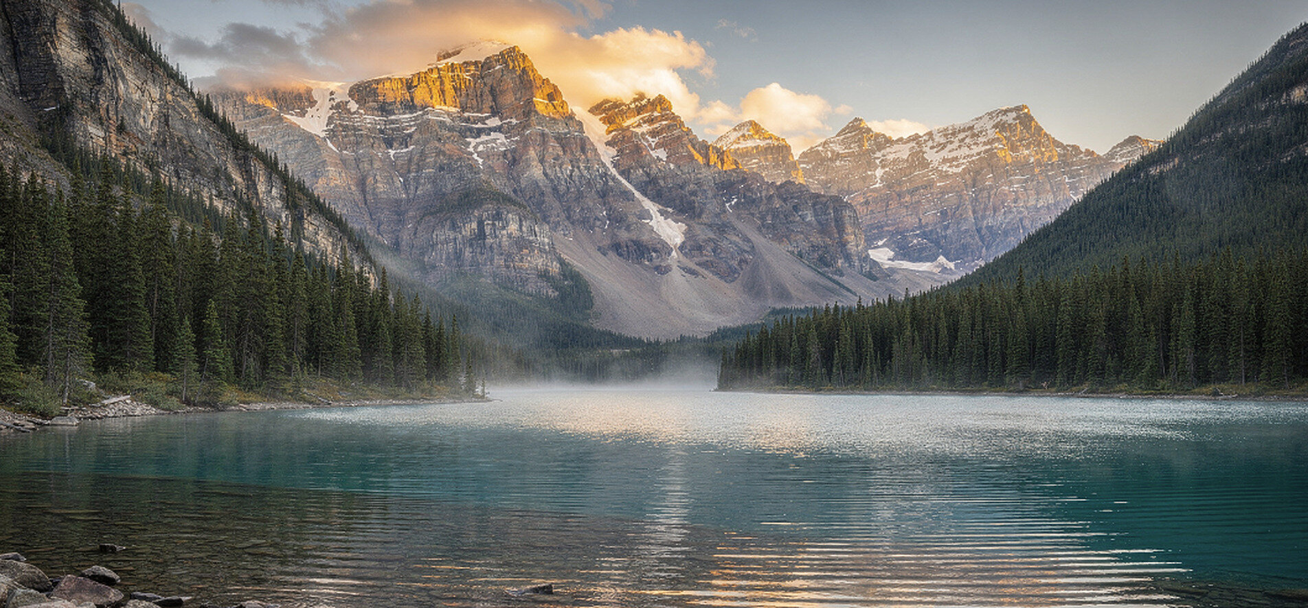 Misty mountain lake in the Kootenays of British Columbia