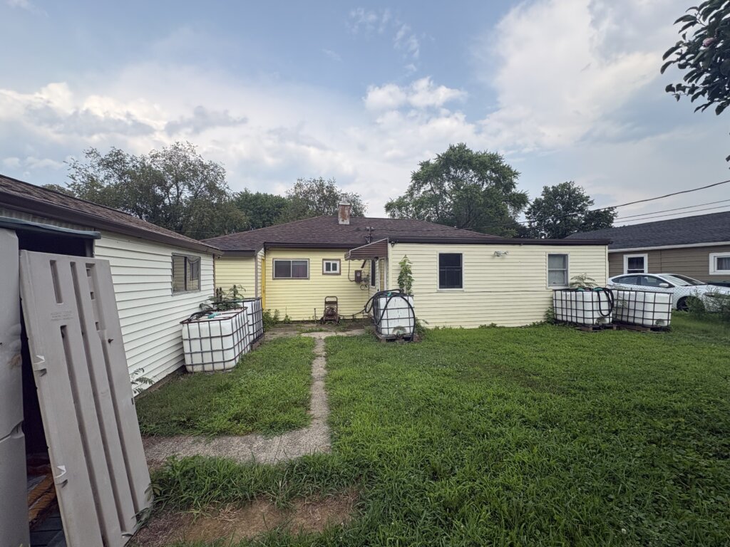 Rear exterior of Winder Road home before renovation