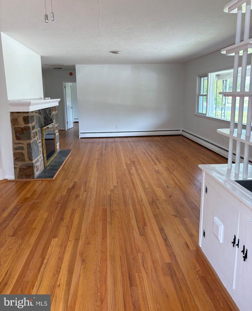 Another view of the renovated living room at 1215 Milltown Road