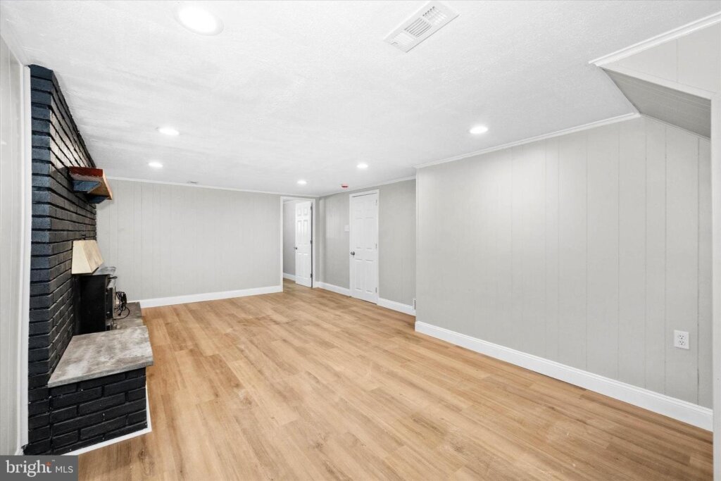 Renovated lower-level living space at 4 Rambo Terrace