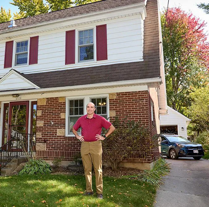 Homeowner discussing a flexible home sale with a real estate buyer