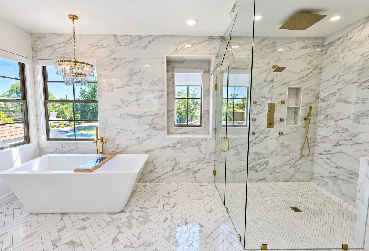 Bathroom with a freestanding tub and a glass walk-in shower