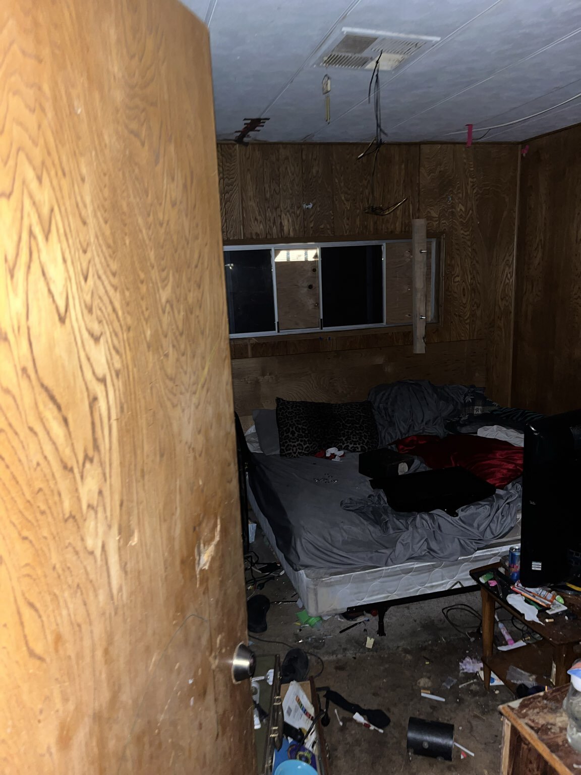 Interior bedroom occupied by squatter relative before inherited property sale