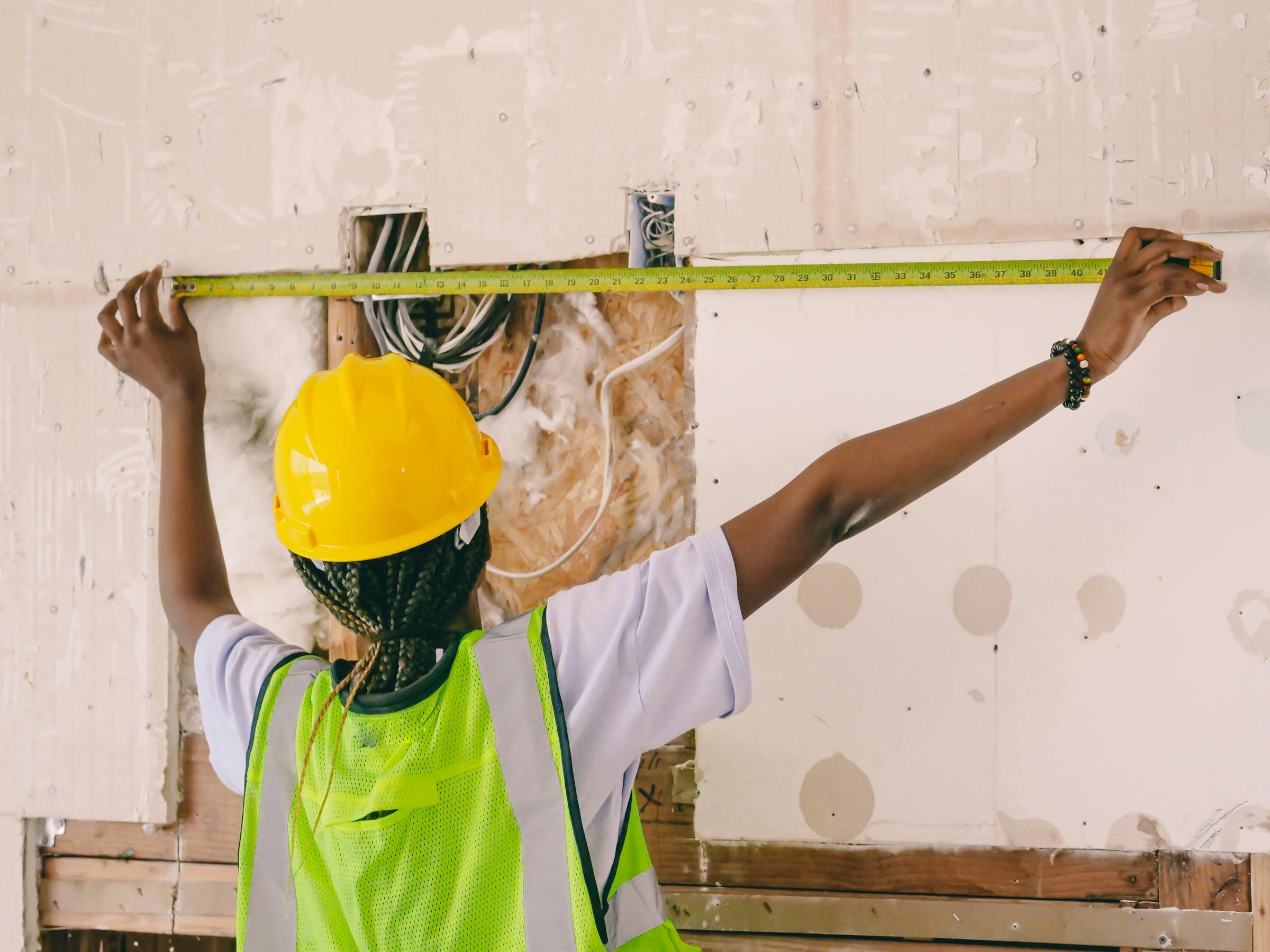 contractor measuring a renovation