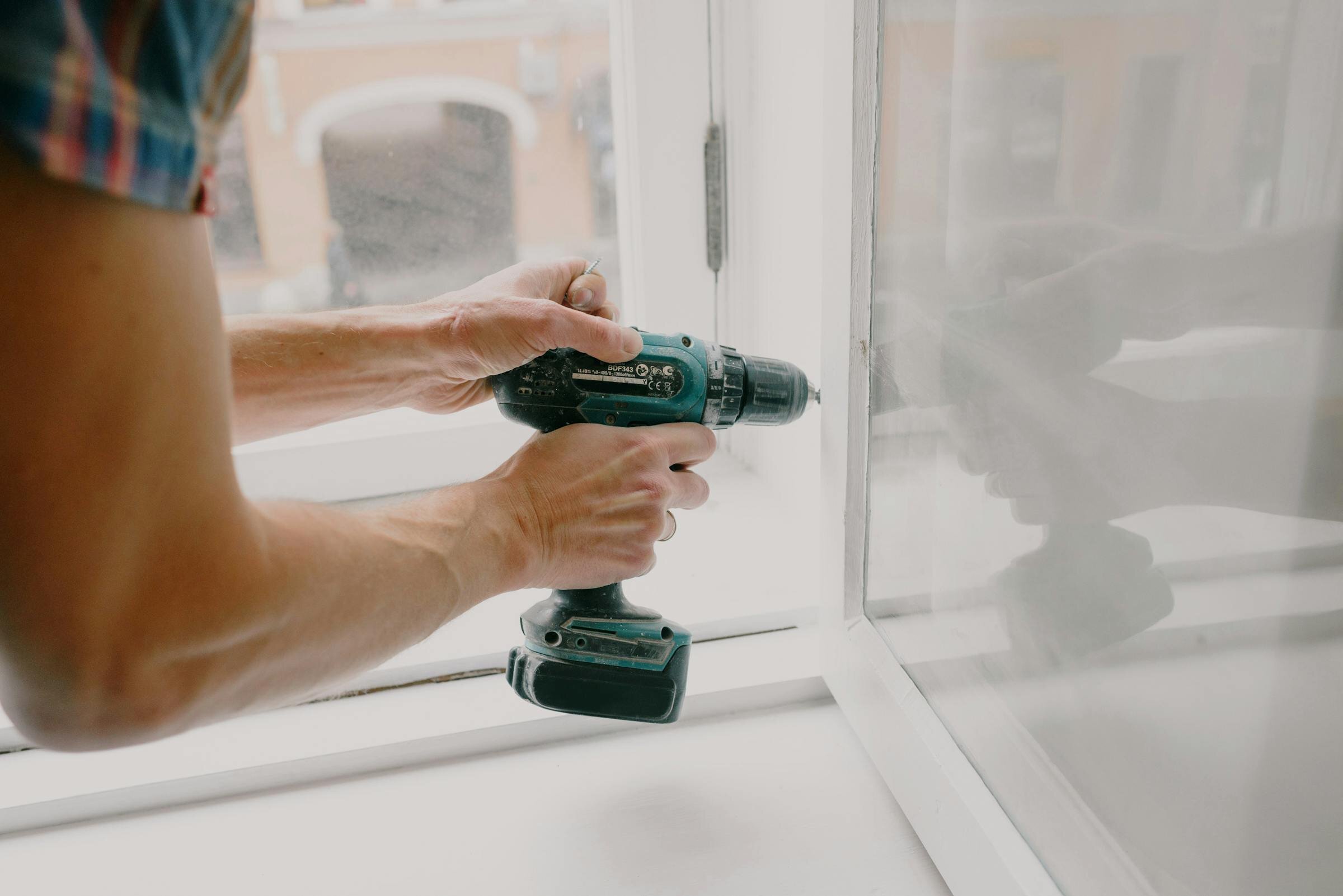 construction worker using tools in a Las Vegas home